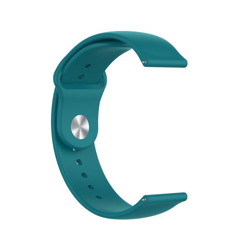 Teal silicone sport watch band with quick release pins and ventilation holes, adjustable loop design
