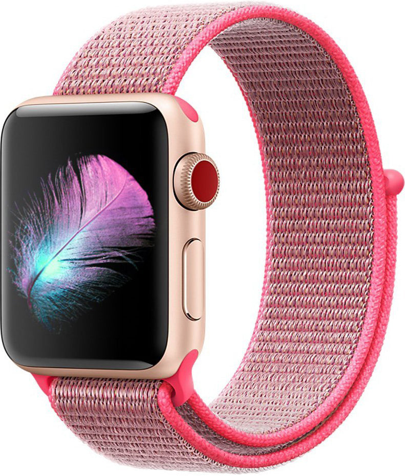 Pink sport loop band for smartwatch with velcro closure and breathable nylon material, compatible with Apple Watch models
