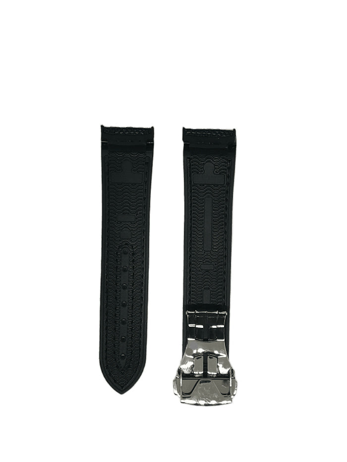 Black curved hybrid rubber watch strap with deployant clasp, textured pattern design on black background