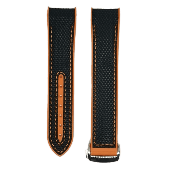Black and orange hybrid rubber watch strap with white stitching and stainless steel deployant clasp
