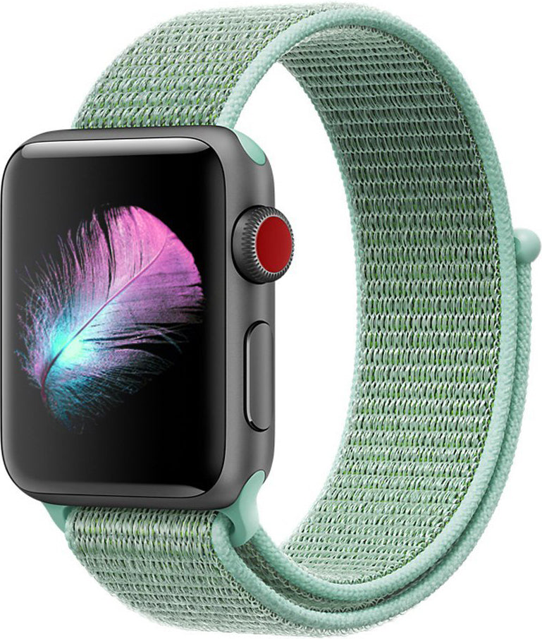 Apple Watch Series 7 with sage green woven sports loop band and red digital crown on black display