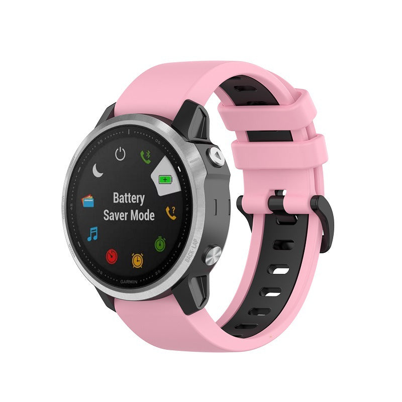 Pink silicone sports watch band with black accents on Garmin smartwatch displaying battery saver mode interface