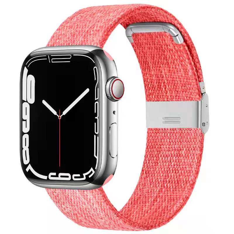 Silver smartwatch with coral pink woven canvas band and magnetic clasp closure