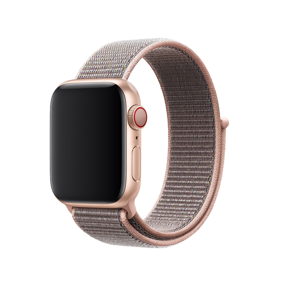 Rose gold smartwatch with black display and pink fabric sport loop velcro band isolated on white background