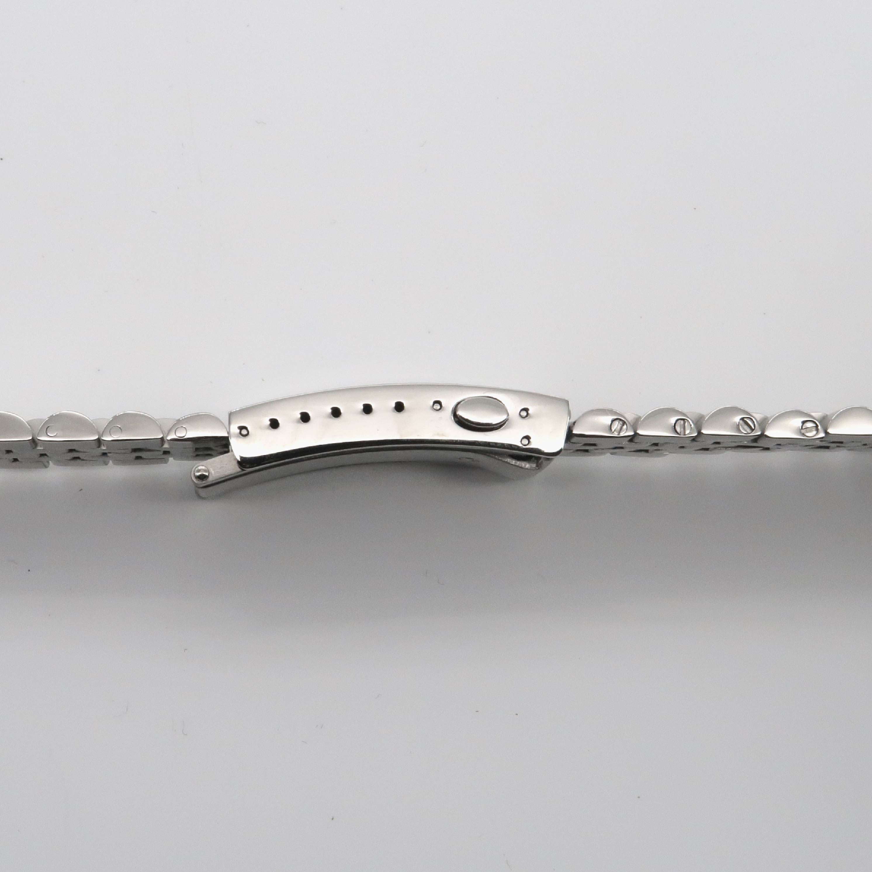 Forstner Model J stainless steel bracelet end link for Omega Speedmaster Professional watches with polished finish