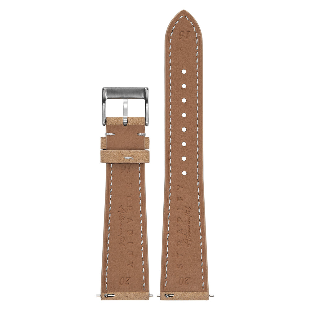 Brown Alcantara leather Apple Watch band with white stitching and stainless steel buckle, displayed flat showing full length and detail
