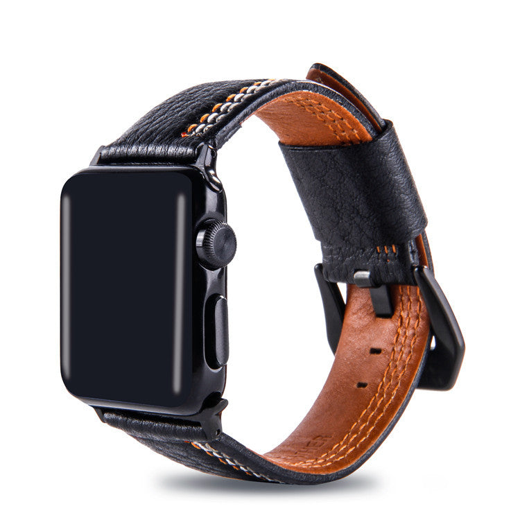 Black leather Apple Watch band with asymmetrical orange stitching, tan inner lining, and black stainless steel connector hardware