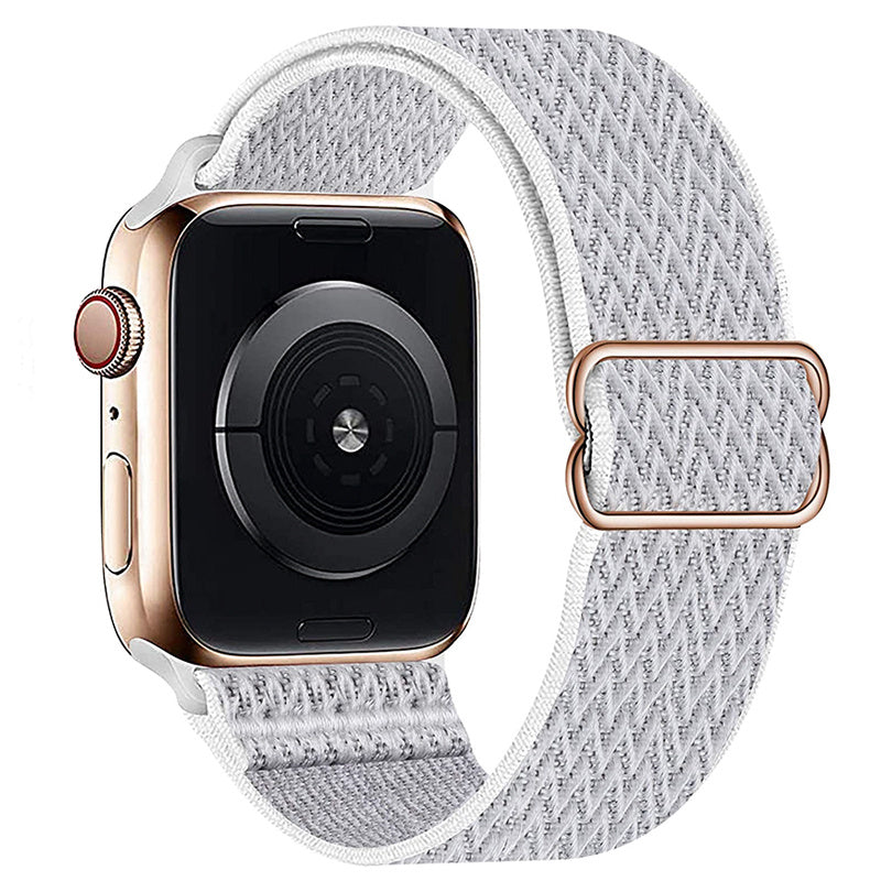 Gold stainless steel smartwatch with light gray woven fabric loop band and red digital crown