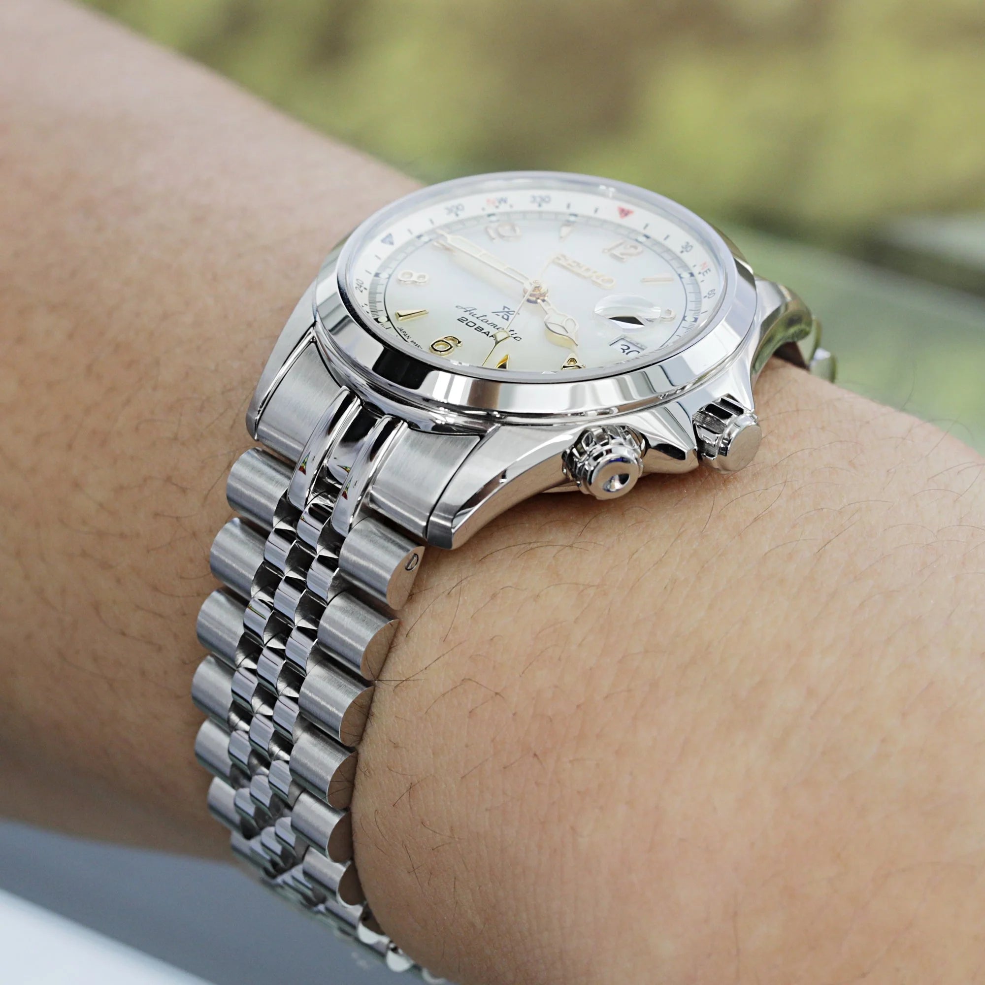 Stainless steel Super-JUB II bracelet with solid links fitted on wrist, compatible with Seiko Alpinist SARB017 and Hamilton Khaki Field watches