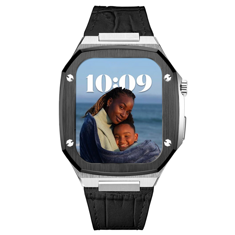 Luxury smartwatch with silver stainless steel case, black leather strap, and digital display showing family photo at 10:09