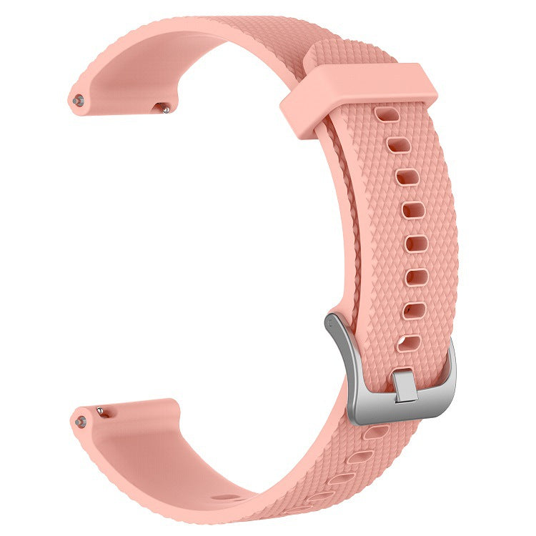 Coral pink silicone quick release watch band with textured strap and metal buckle connector