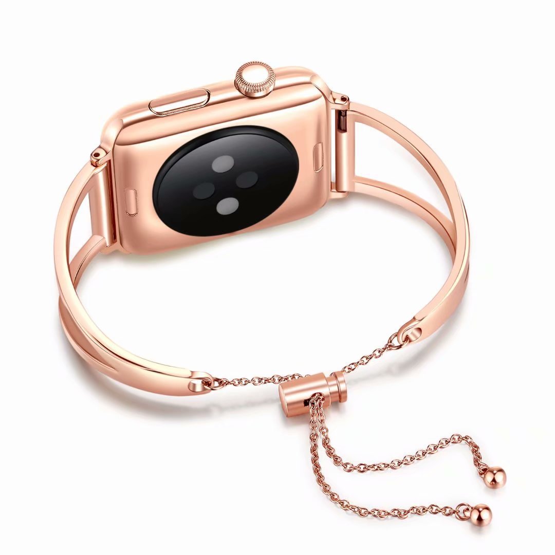 Rose gold stainless steel smartwatch with black display and matching rose gold bangle bracelet with chain detail
