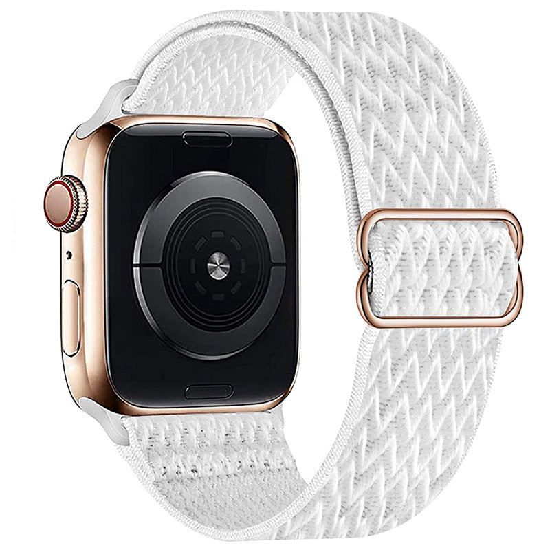 Gold smartwatch with white braided textile loop band, featuring black digital display and adjustable magnetic closure