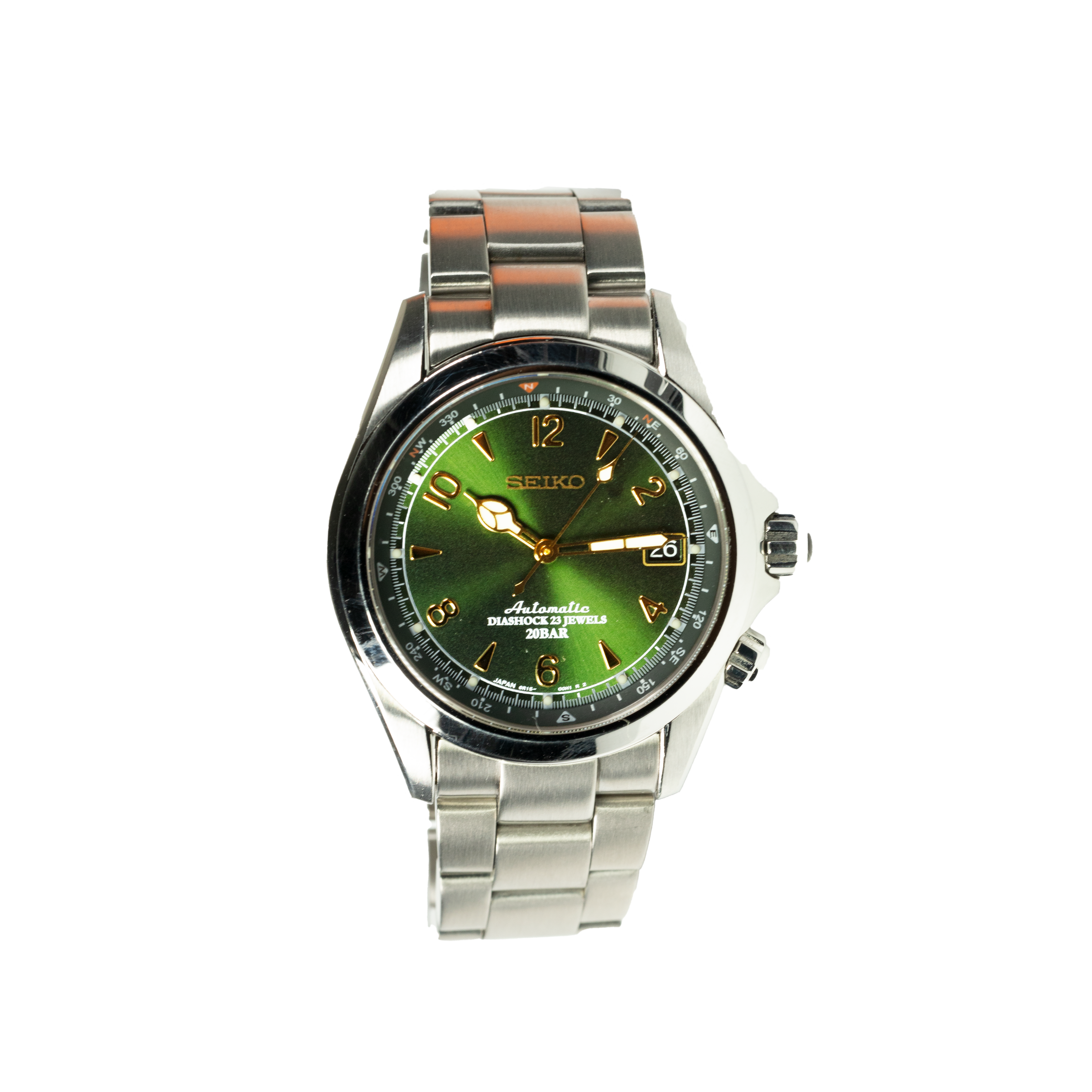 Seiko Alpinist automatic watch with green dial, stainless steel bracelet, and gold hour markers