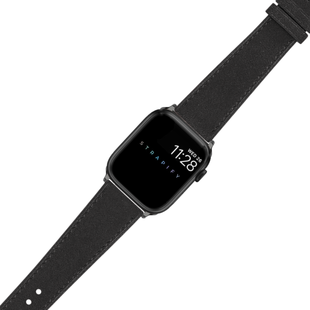 Black Alcantara leather band Apple Watch with square face displaying time and Strapify branding