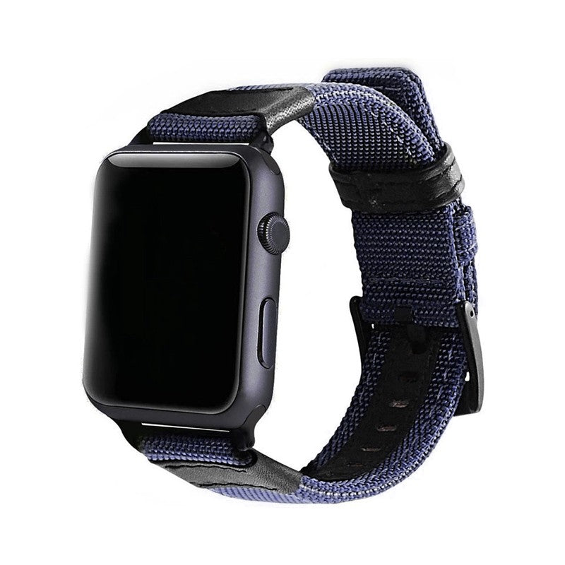 Space gray Apple Watch with navy blue canvas nylon sport band and black leather accents