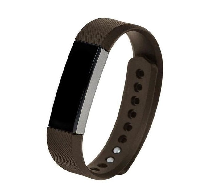 Brown silicone fitness tracker band with black display screen and adjustable snap closures