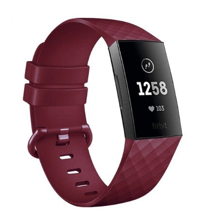 Burgundy silicone fitness tracker with textured band and digital display showing heart rate monitoring
