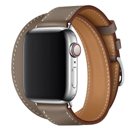 Silver stainless steel smartwatch with double tour tan leather band and white stitching detail