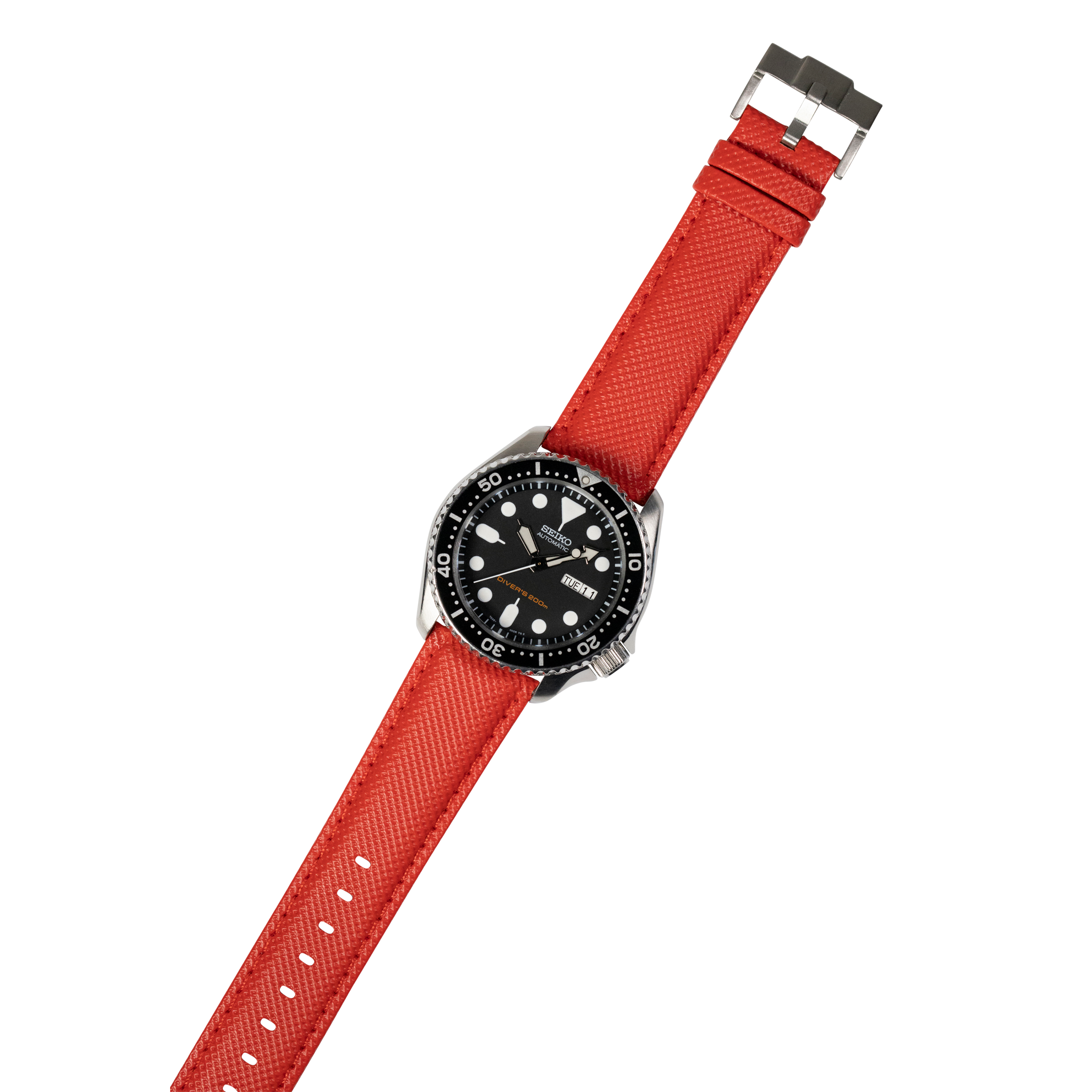 Seiko dive watch with black dial and stainless steel case on red sailcloth quick release strap