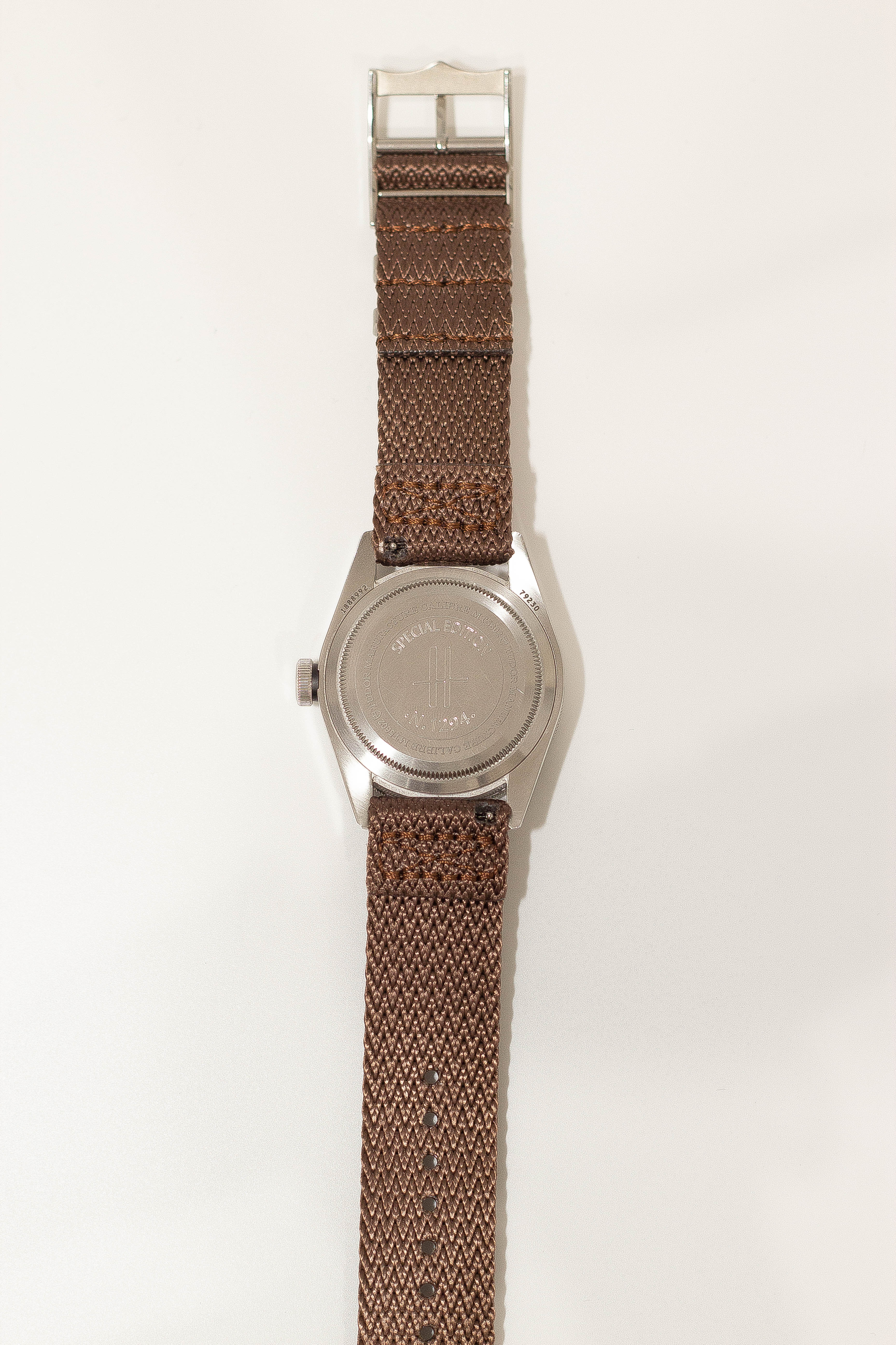 Vintage military watch with stainless steel case, brown fabric Militex strap and quick release mechanism
