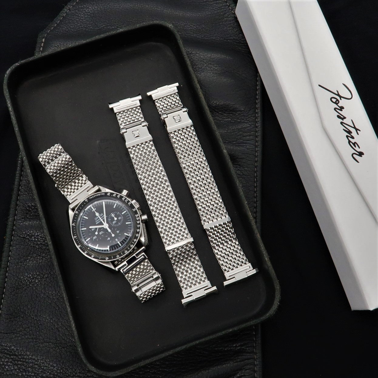 Silver mesh watch bracelet with horned ends in luxury presentation box, interchangeable strap set
