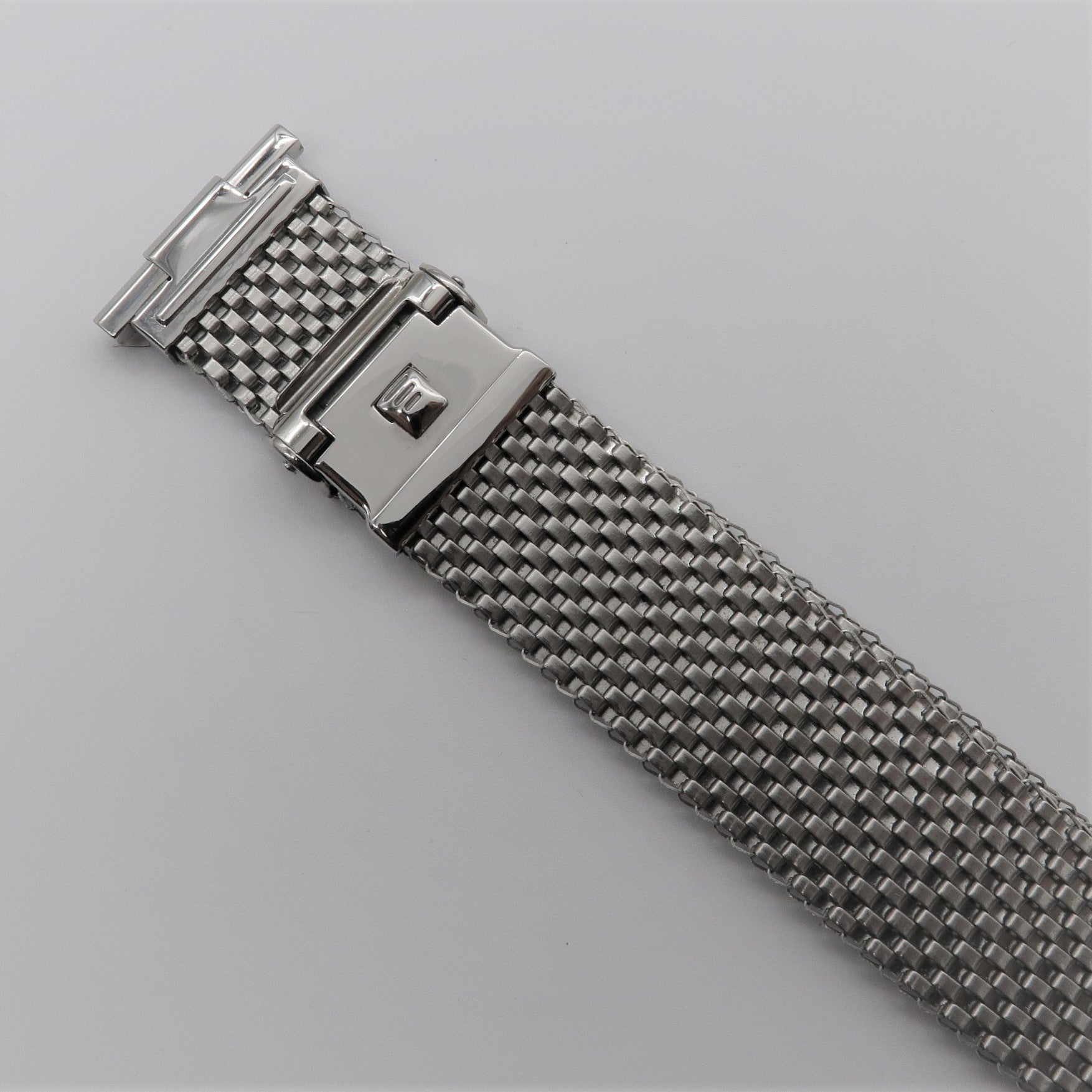 Stainless steel mesh watch bracelet with straight ends and push-button clasp closure, wide version design
