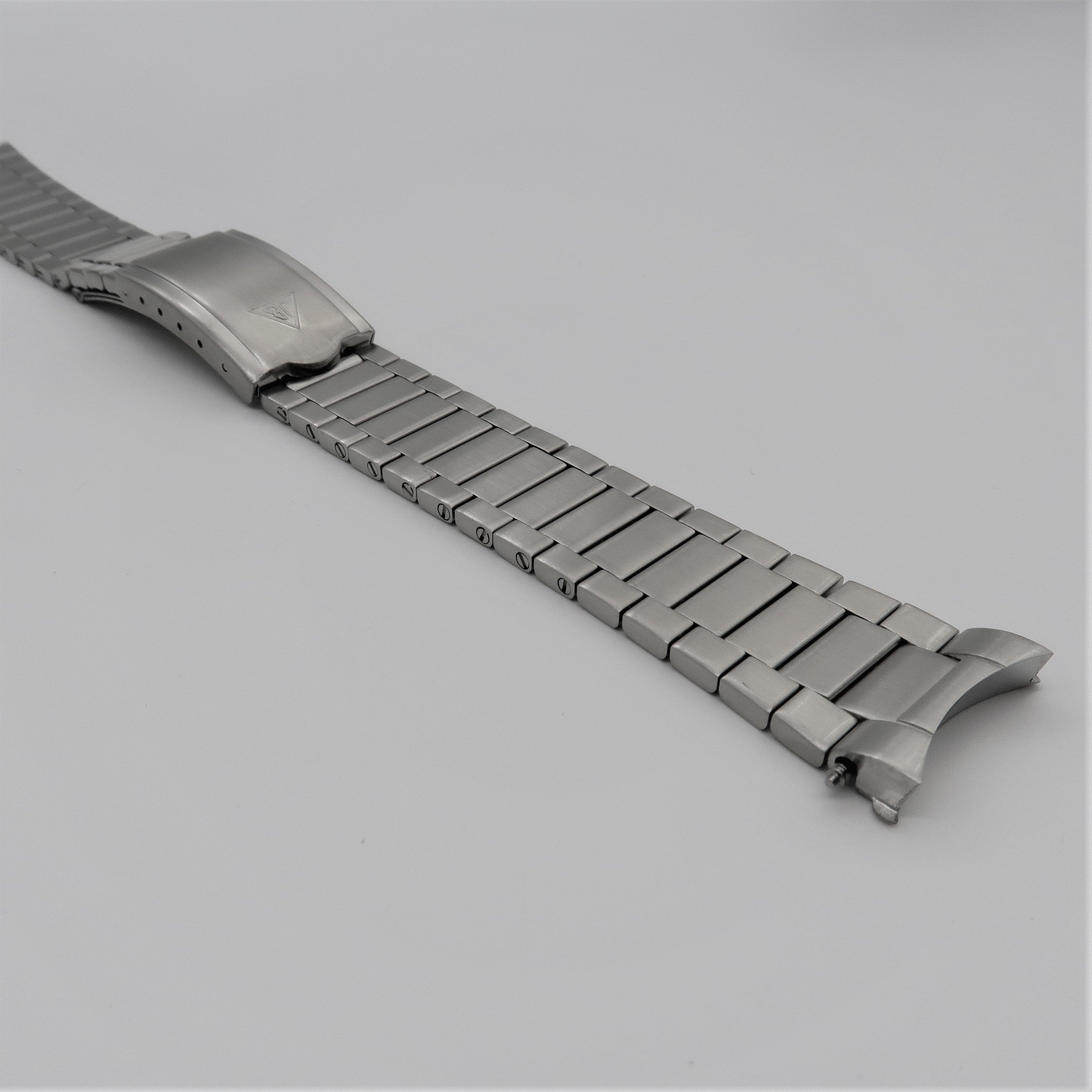 Brushed stainless steel flat link bracelet with deployant clasp for Tudor Black Bay 58 watch