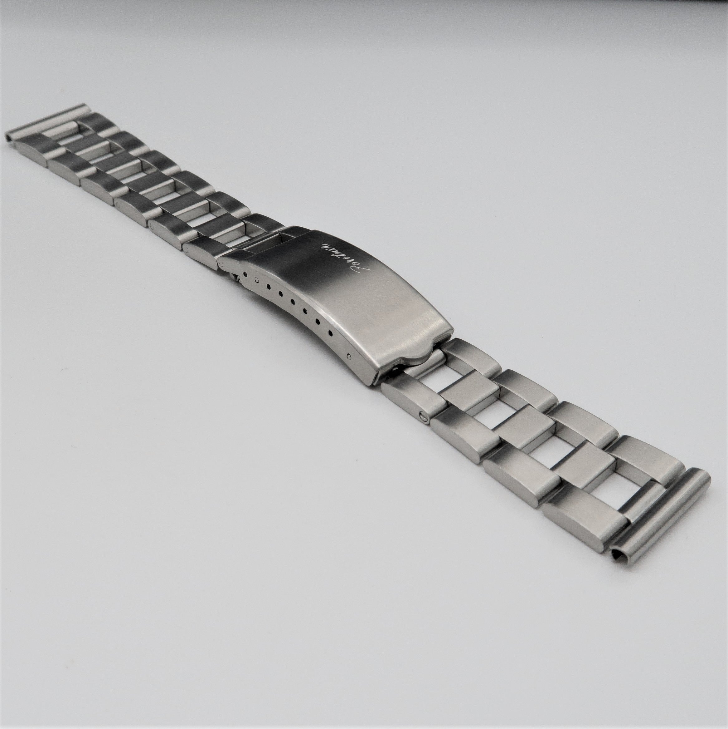 Stainless steel ladder bracelet with brushed finish, adjustable metal links and secure clasp closure