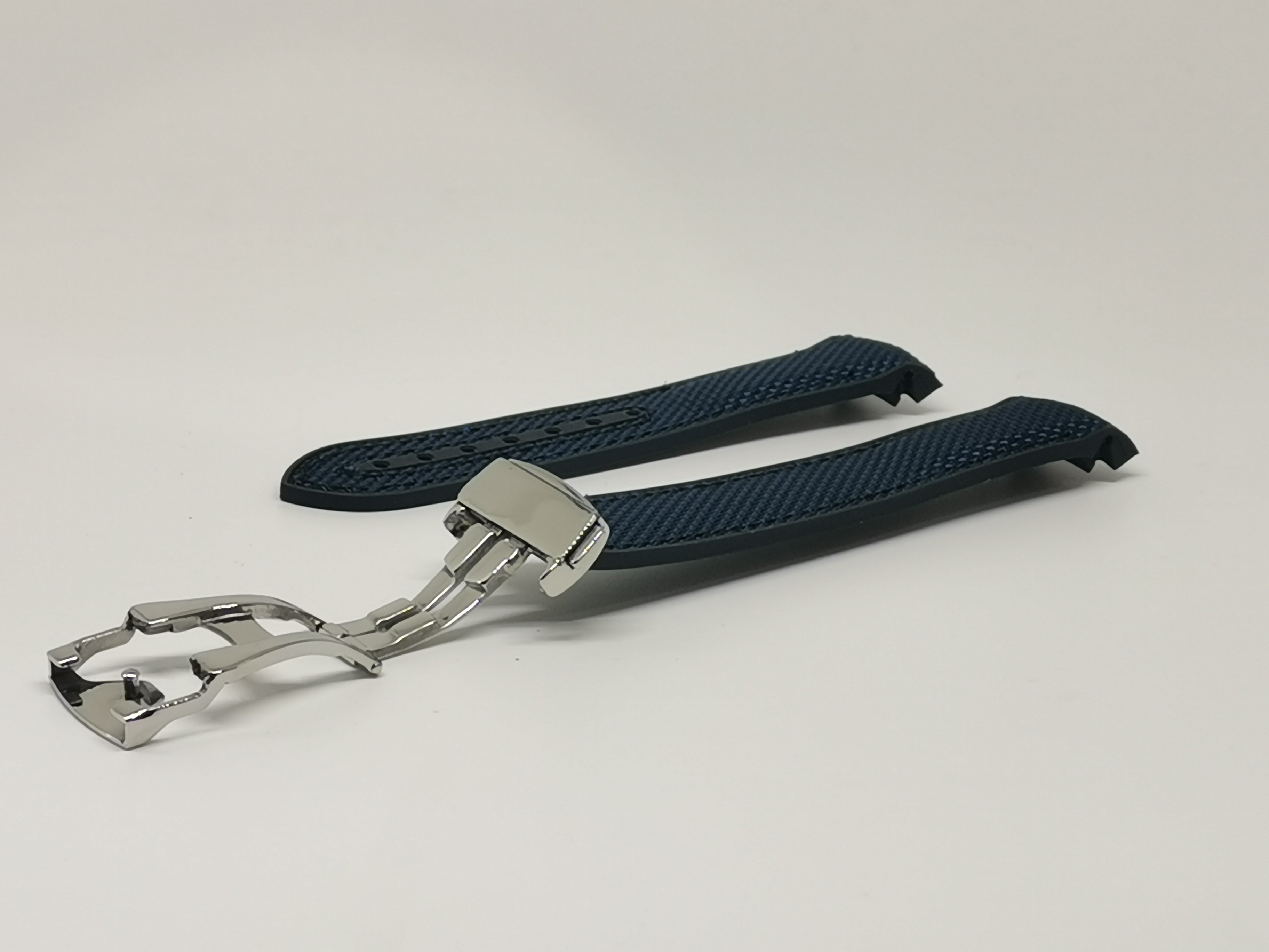 Navy blue curved King Hybrid Rubber watch strap with polished silver deployant clasp fastener