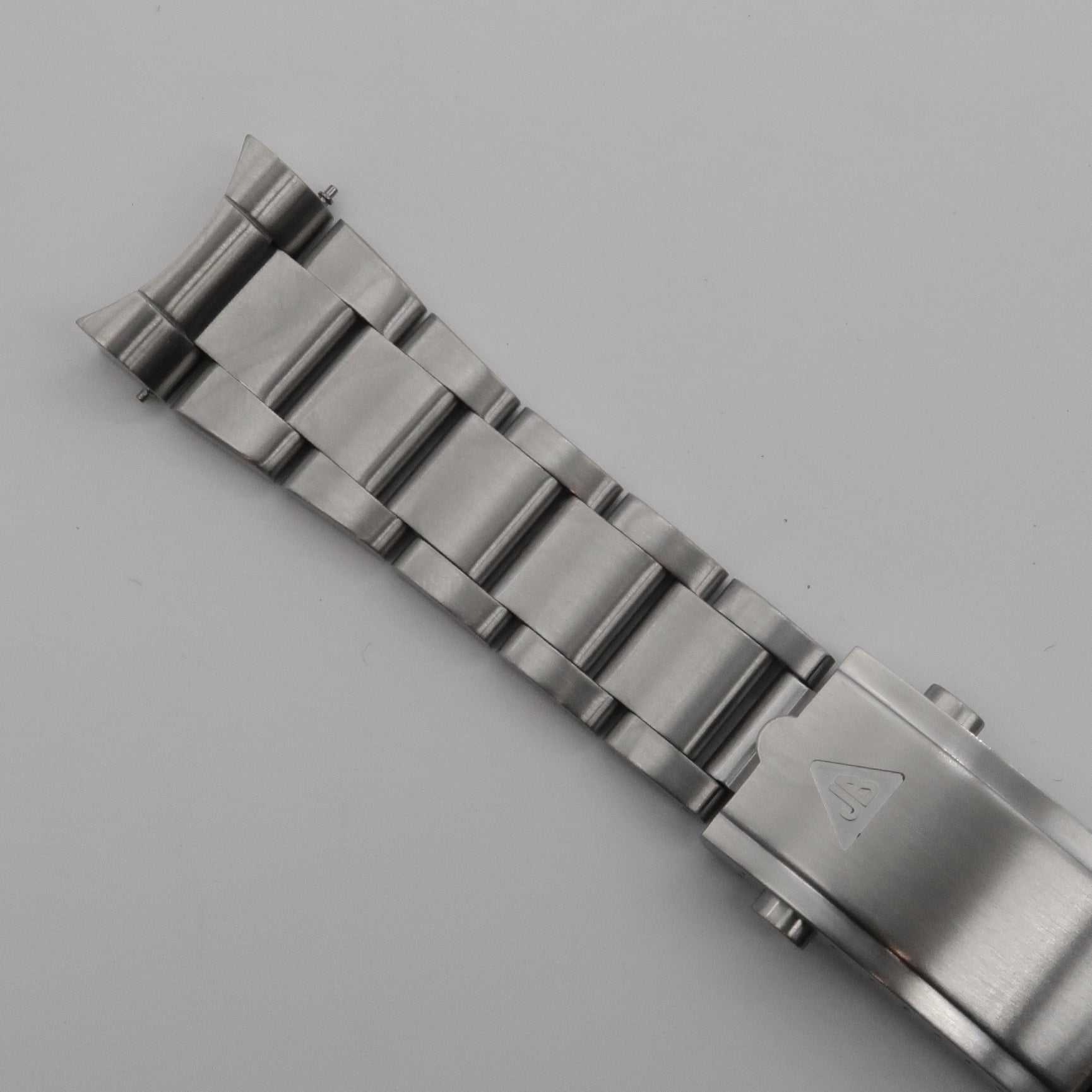 Stainless steel watch bracelet with polished links and end links for Omega Speedmaster timepiece