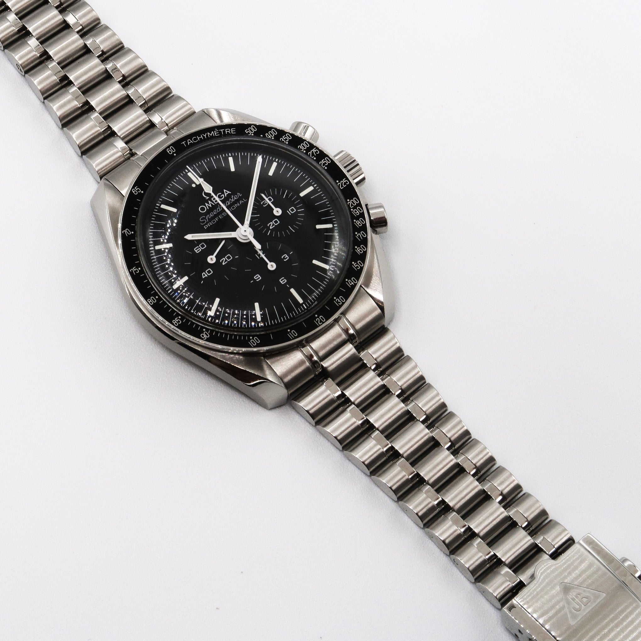 Stainless steel Speedmaster Professional chronograph watch with black dial and tachymetre bezel on three-link metal bracelet