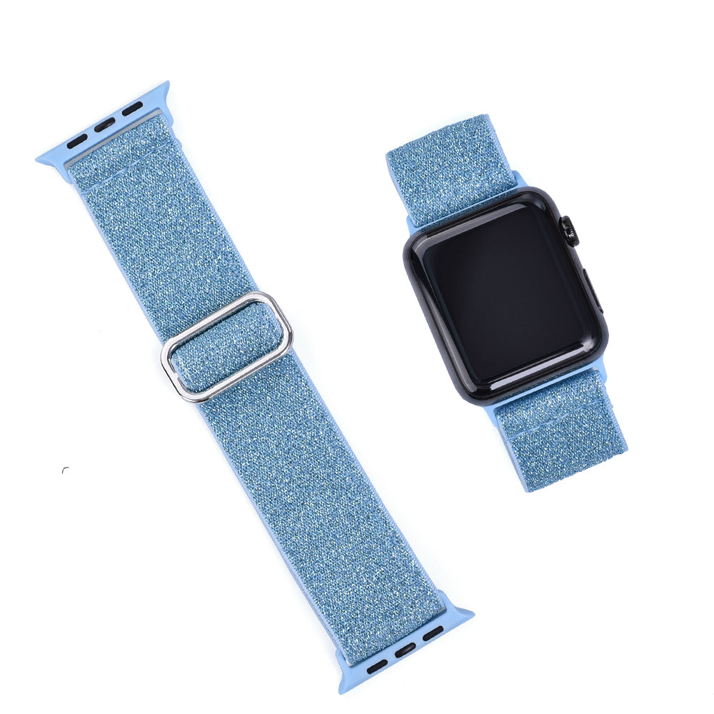 Blue sparkle woven loop band for Apple Watch with connector adapter shown on and off watch face