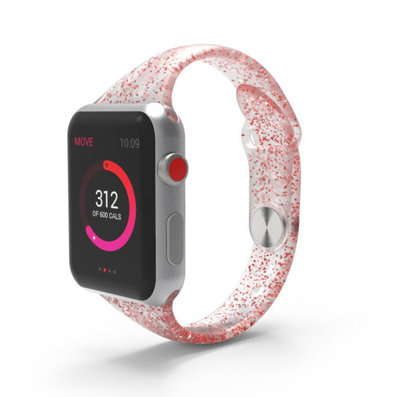 Red glitter silicone band with silver aluminum smartwatch showing fitness activity tracker on black display