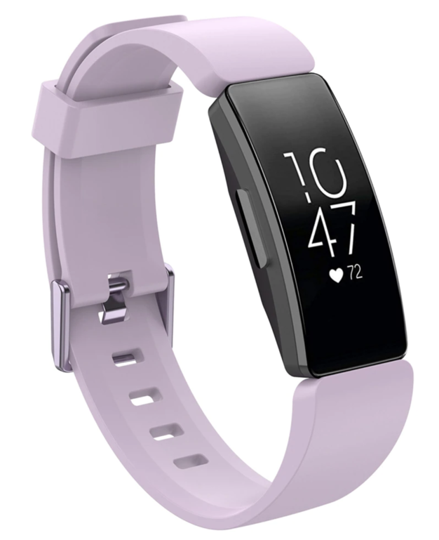 Lavender silicone fitness tracker band with black display showing time and heart rate, adjustable buckle strap