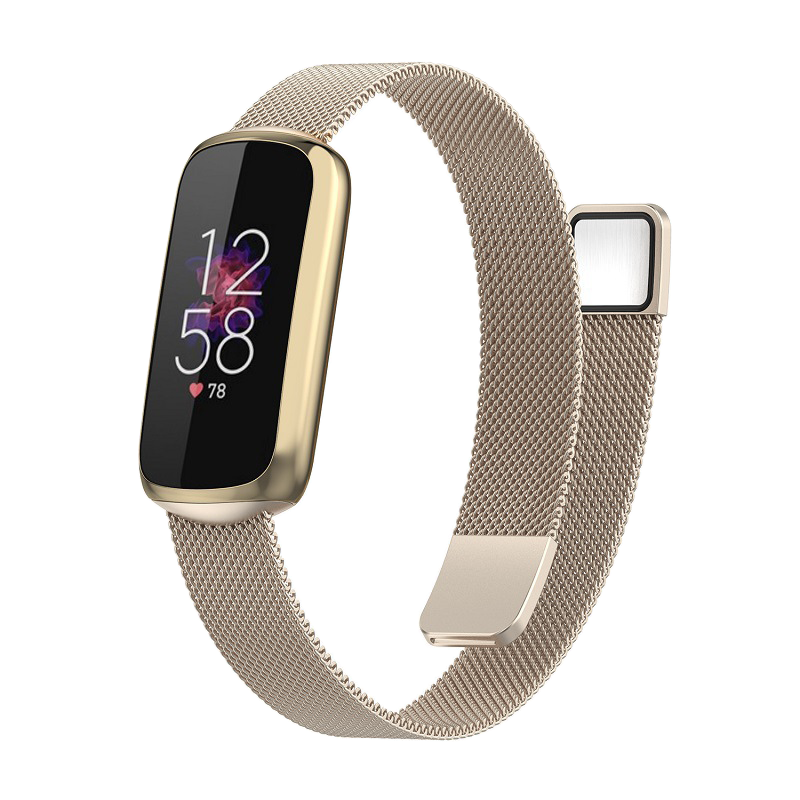 Fitbit Luxe fitness tracker in champagne gold with stainless steel Milanese mesh band displaying time and heart rate on OLED screen