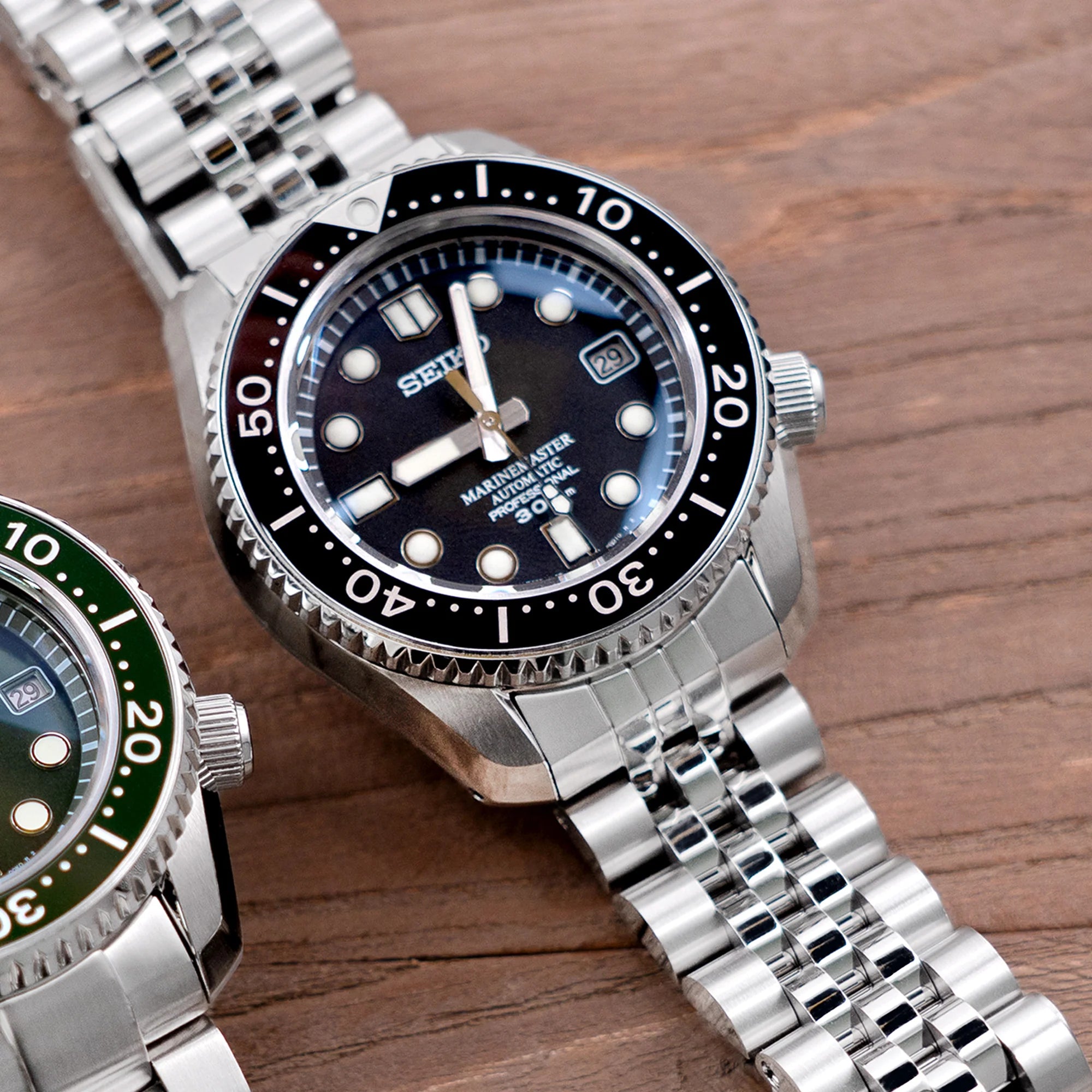 Strapcode Angus-J stainless steel jubilee bracelet fitted on Seiko MarineMaster MM300 SDBX001 dive watch with black dial