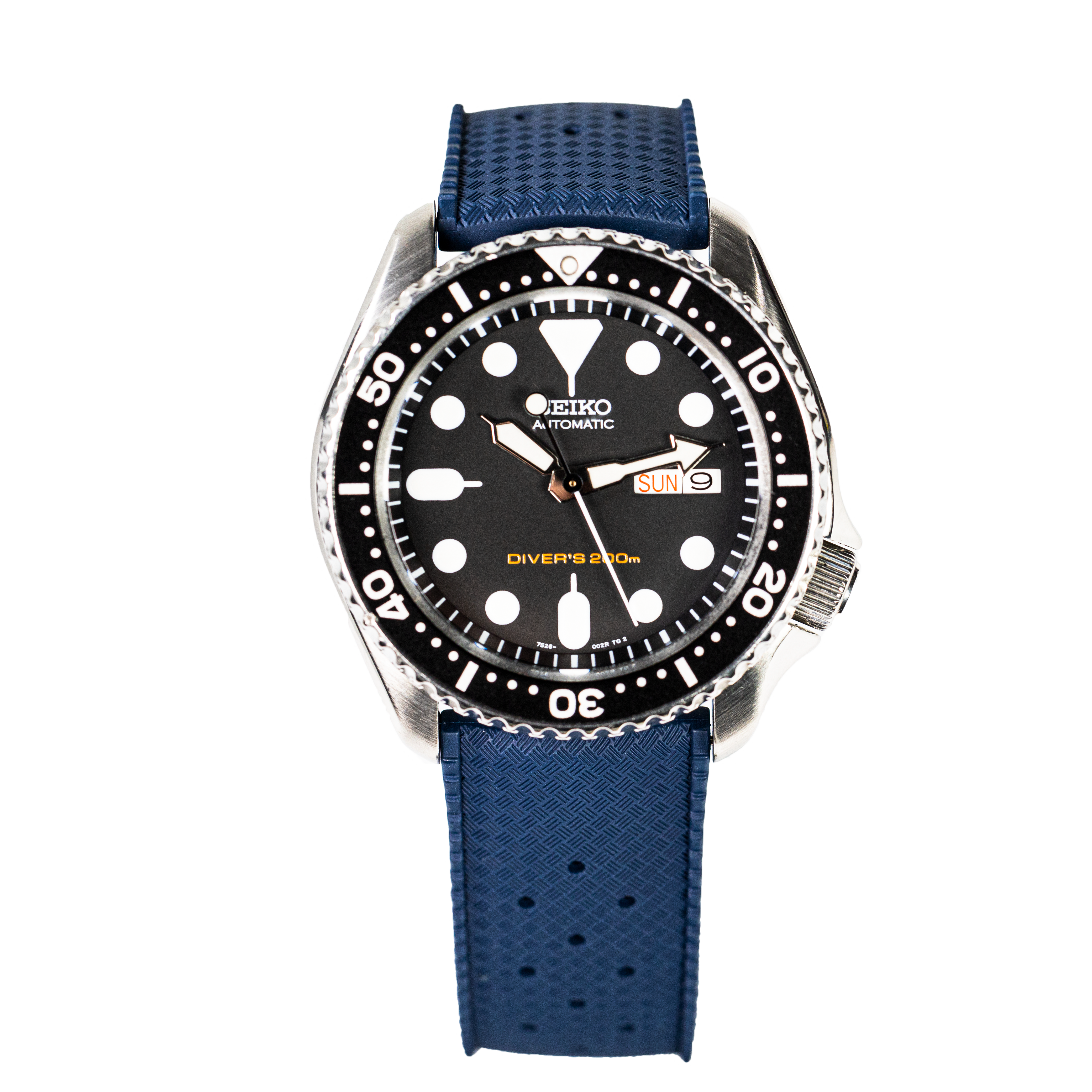 Seiko automatic diver watch with black dial, blue rubber strap, and 200m water resistance rating