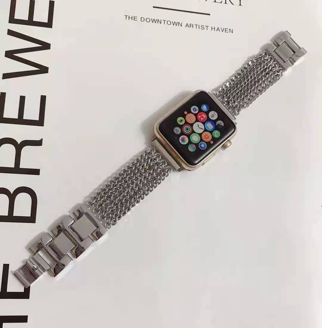 Silver stainless steel mesh bracelet band for Apple Watch with colorful app icons displayed on watch face
