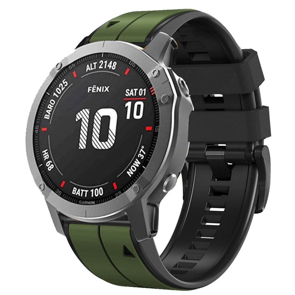 Fenix smartwatch with two-tone green and black silicone QuickFit band, digital display showing date and time