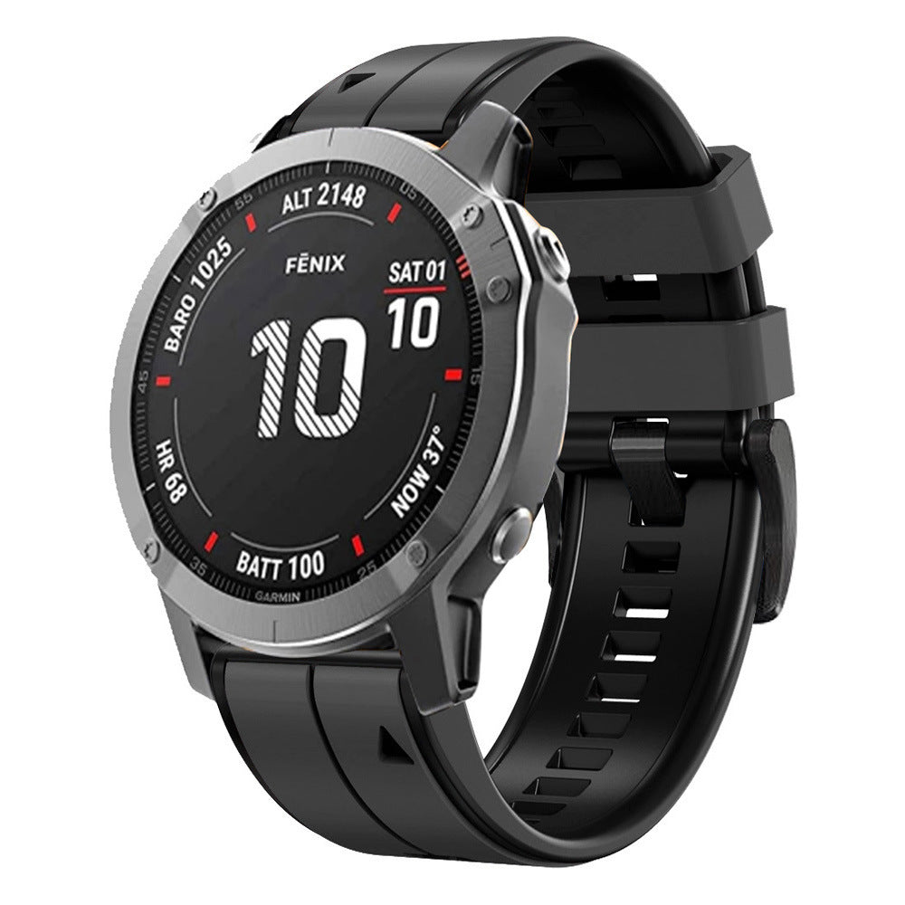 Garmin Fenix smartwatch with black silicone band displaying date and altitude metrics