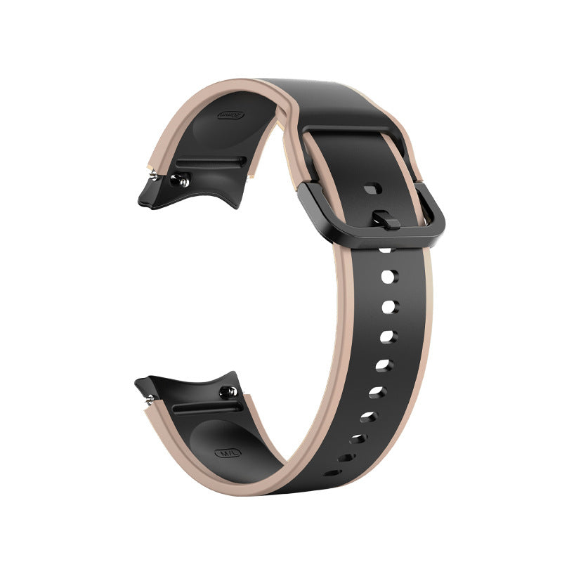 Two-tone silicone smartwatch band with rose gold and black design, adjustable fit with pin buckle closure
