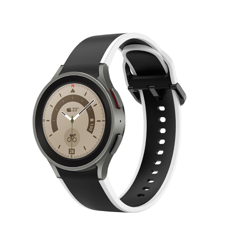 Two-tone black and white silicone smartwatch band on stainless steel watch with beige dial and health tracking features