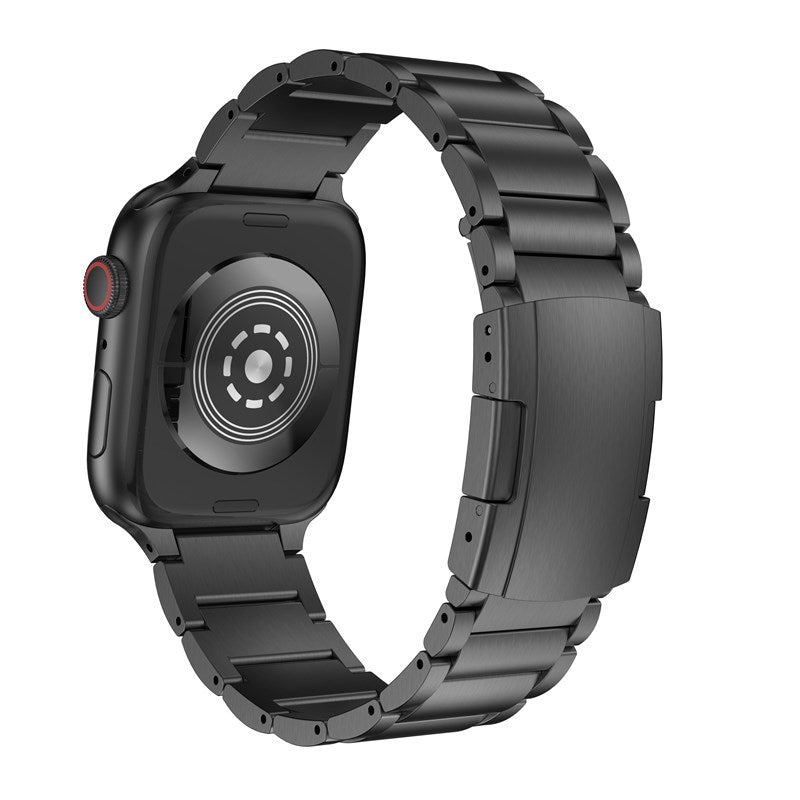 Black stainless steel bracelet band with link design for Apple Watch, showing back case and secure clasp closure