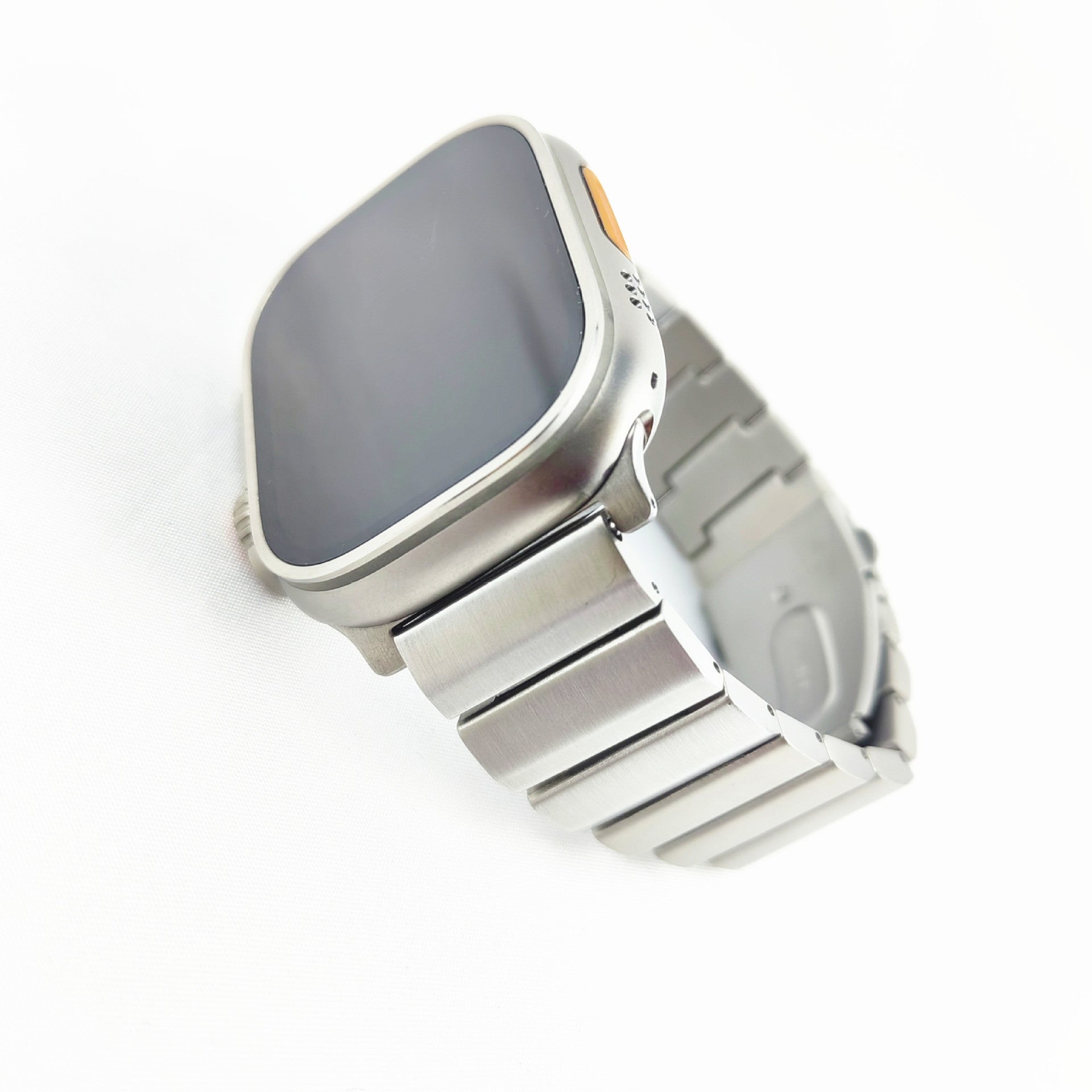 Titanium smartwatch with square display, white and silver metal bracelet band on white background
