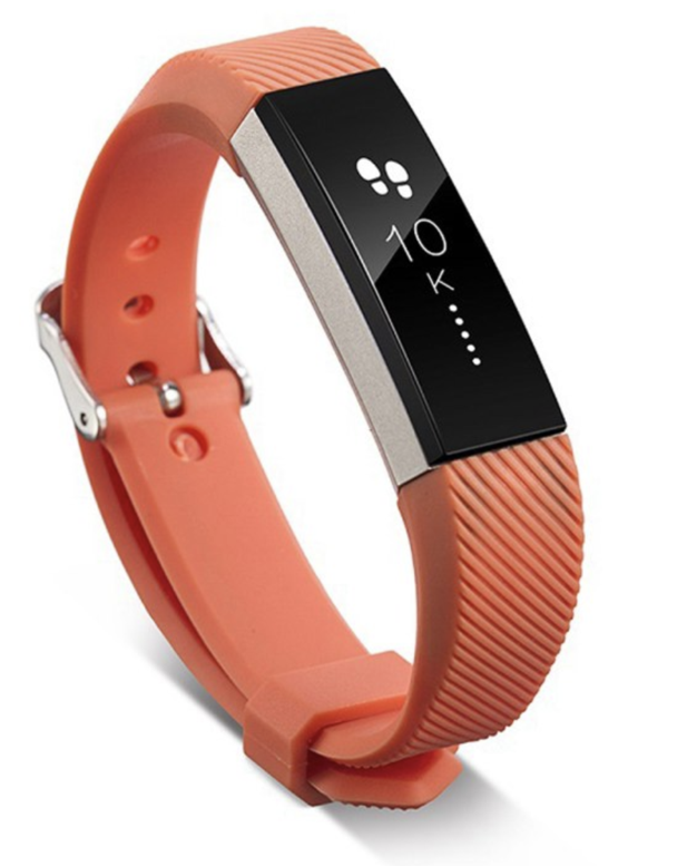 Coral orange Fitbit Alta fitness tracker with textured silicone band and silver buckle clasp, OLED display showing time and activity metrics