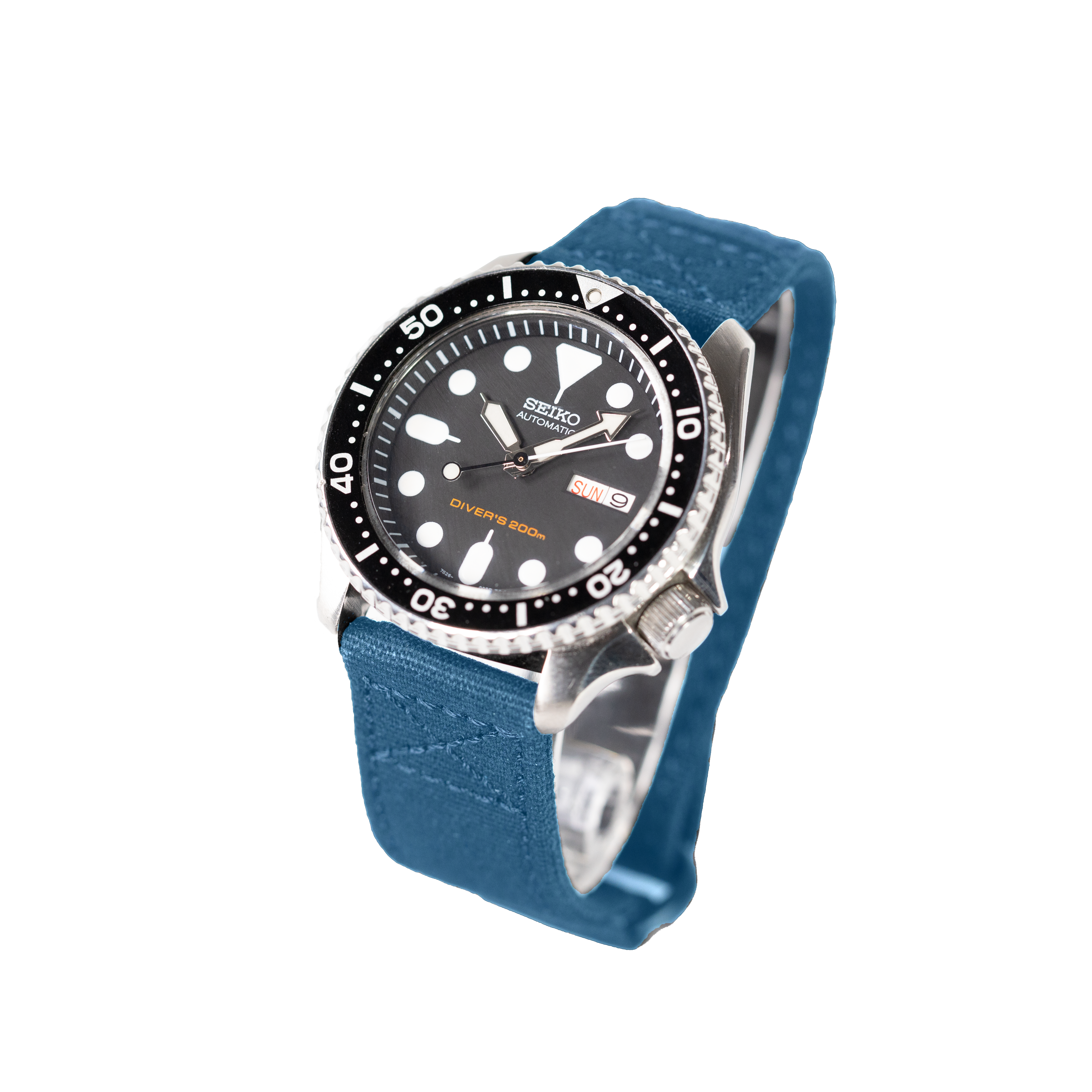 Seiko automatic diver's watch with black dial, white hour markers, 200m water resistance, and blue fabric quick release strap