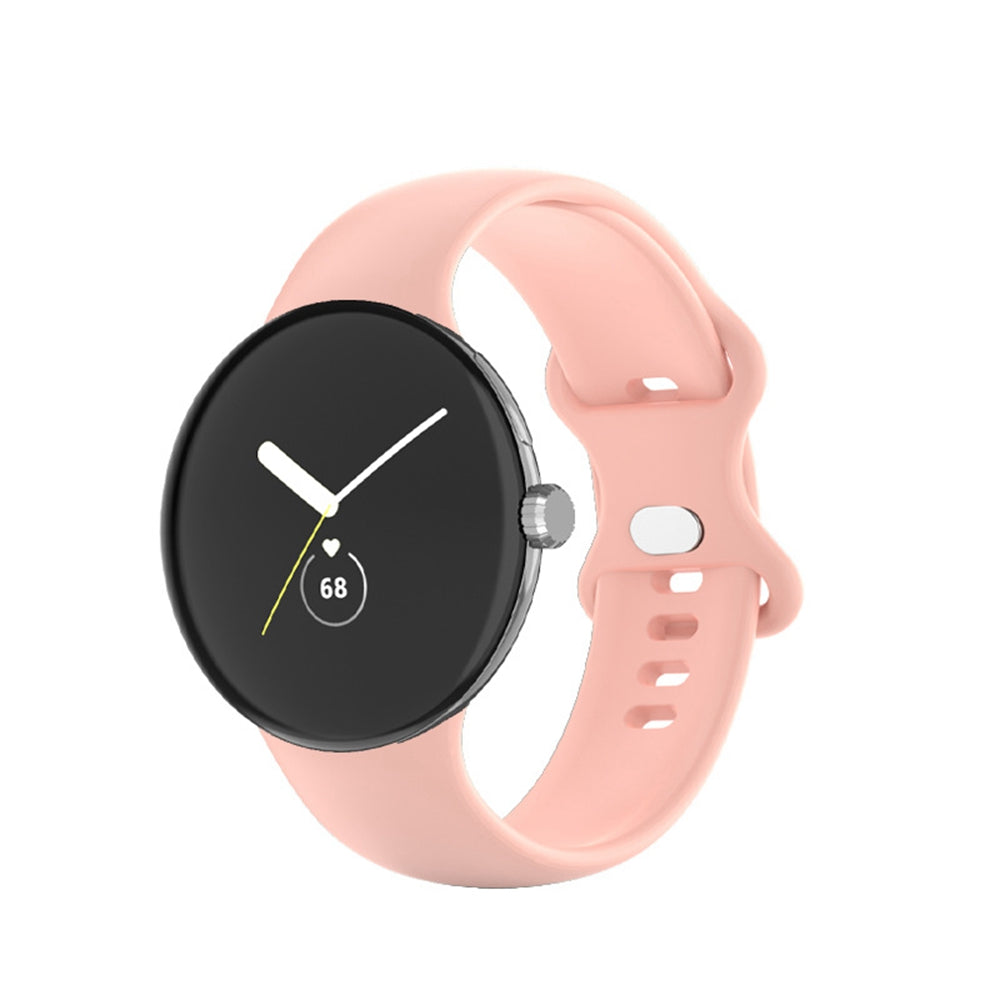 Smartwatch with black round face and pink silicone band displaying time and heart rate monitor