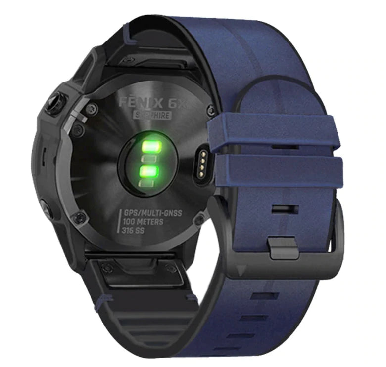 Fenix 6X Sapphire GPS sports watch with navy blue QuickFit hybrid leather band and illuminated green LED display