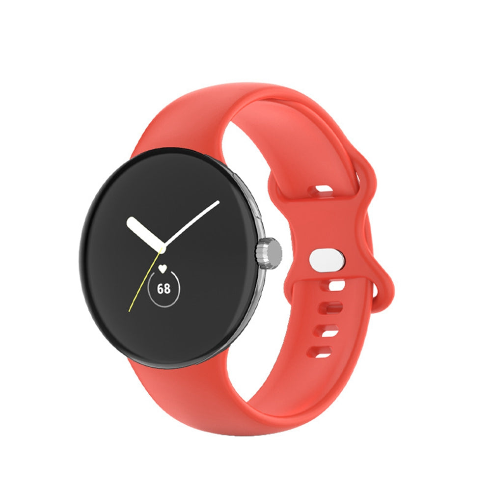 Red silicone smartwatch band with black round dial displaying time and heart rate monitor on white background